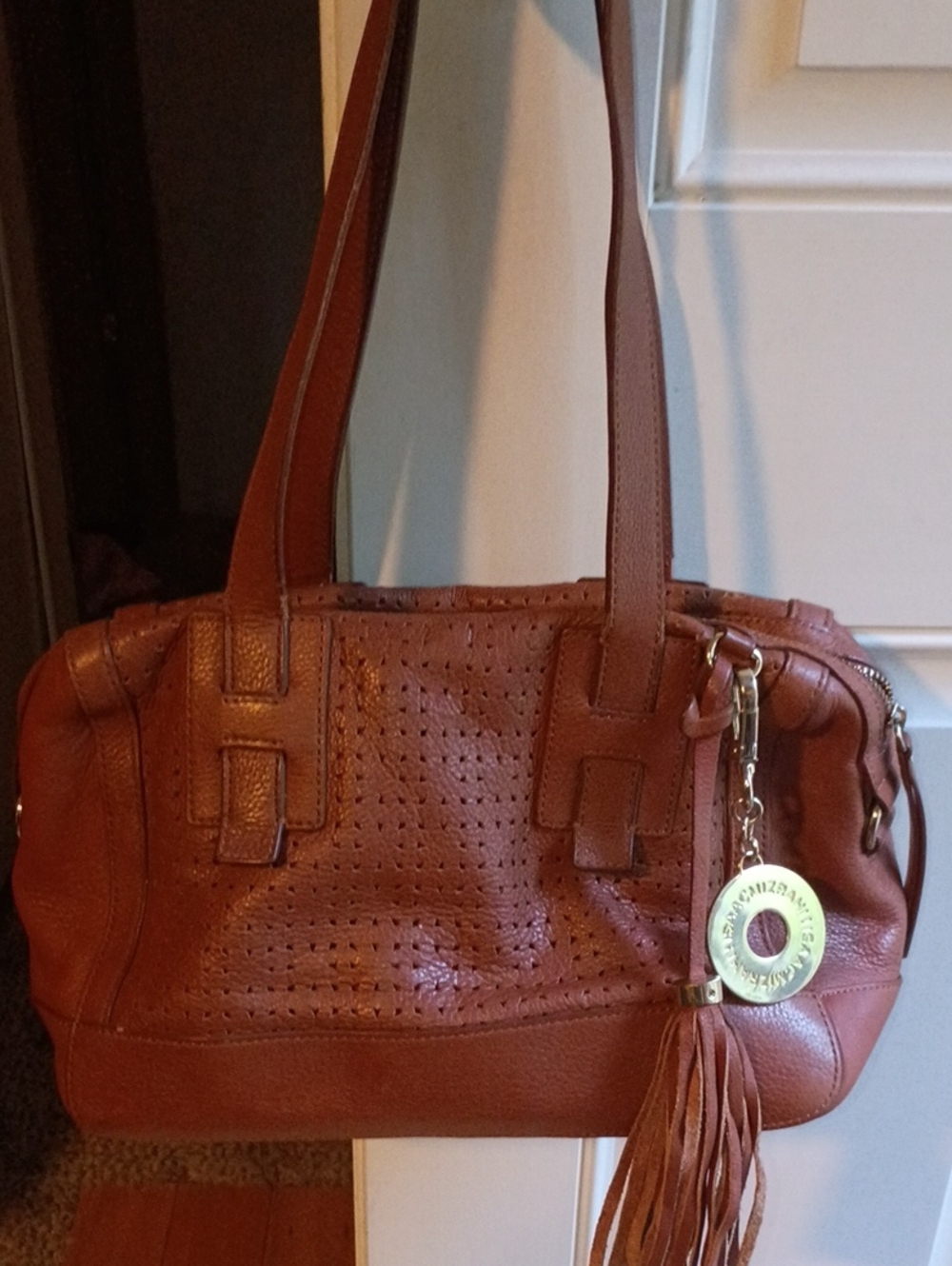 Isaac Mizrahi Brown Perforated Leather Shoulder Bag with Tassel Charm